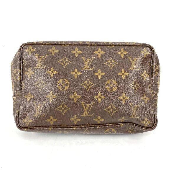AUTHENTICITY GUARANTEED LOUIS VUITTON Monogram Trousse Toilette - Picture 1 of 11